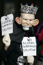 Protestor in Bush Mask demanding leadership on global warming